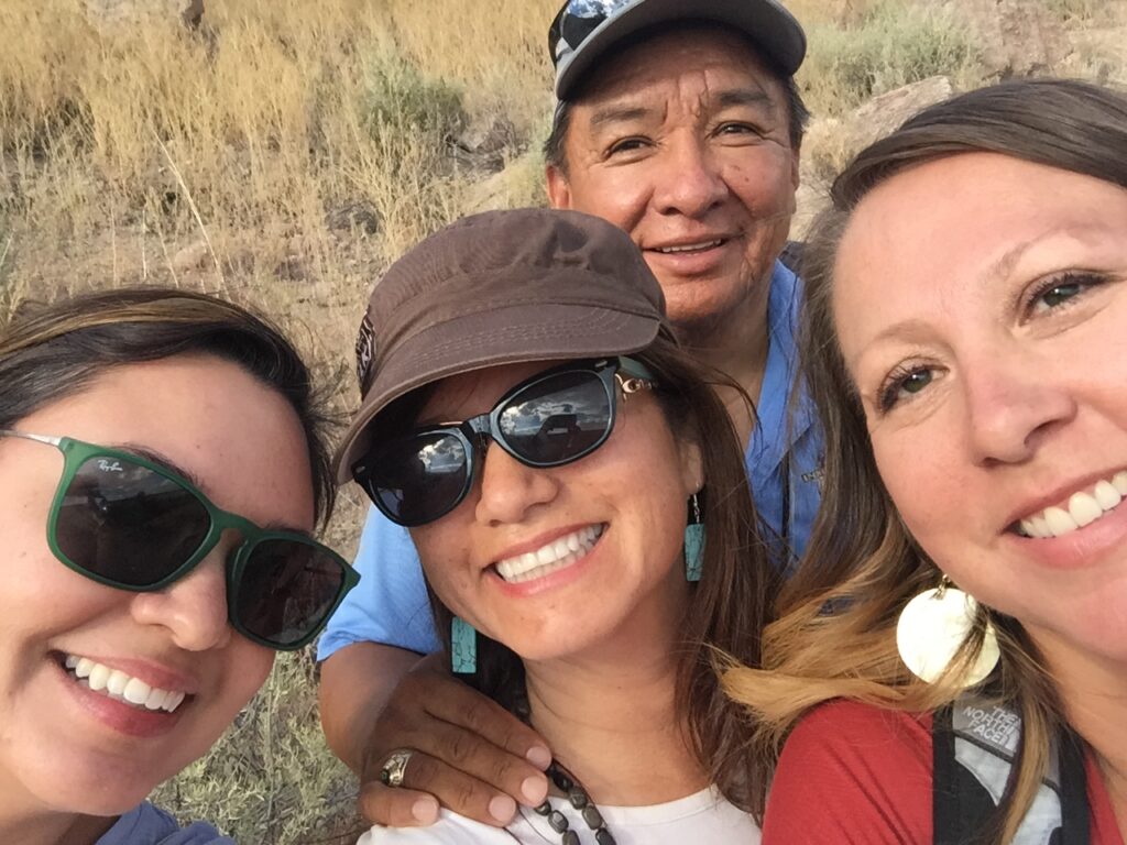 Shendo (in back) with tour organizers/First Nations employees Abi Whiteing, left, Eileen Egan and Jona Charette.
